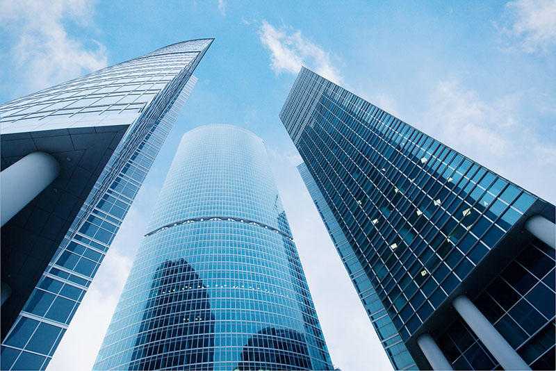 Ngắm nhìn 30 vách kính hệ Semi chất cho mọi công trình 11 Tòa nhà thiết kế theo kiểu hiện đại sử dụng vách kính cao cấp