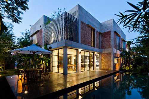 Mẫu nhà kính đẹp với thiết kế vách tường kính độc đáo 3 Nhà hiện đại tầng 1 thiết kế bằng tường kính tầng 2 cửa sổ bằng nhôm kính